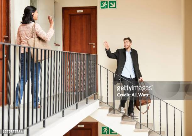 neighbours waving to each other while going to work - neighbor stock pictures, royalty-free photos & images