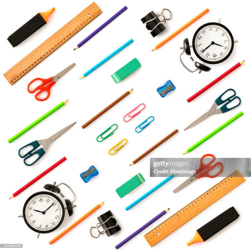 Colorful school stationery and supplies on white background