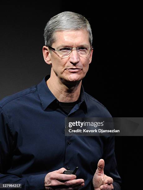 Apple CEO Tim Cook speaks at the event introducing the new iPhone 4s at the company's headquarters October 4, 2011 in Cupertino, California. The...