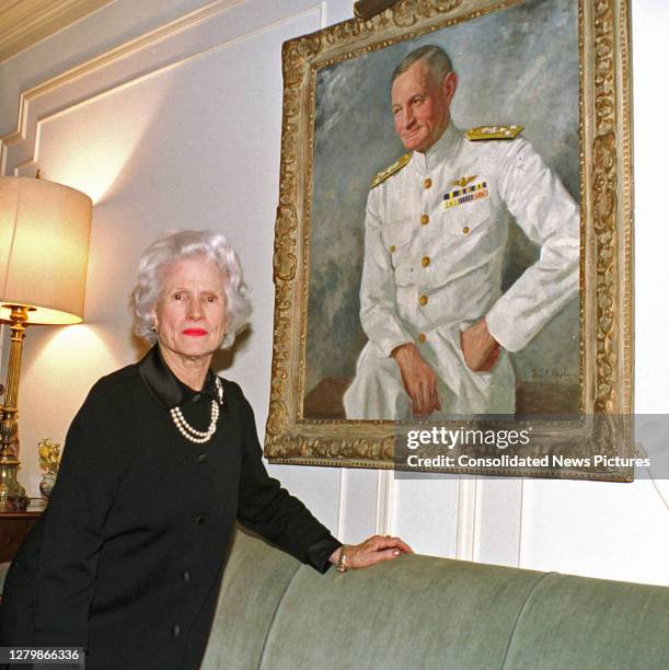 Portrait of Roberta McCain as she poses in her apartment, Washington DC, February 18, 2000. Beside her is painted portrait of her late husband, US...