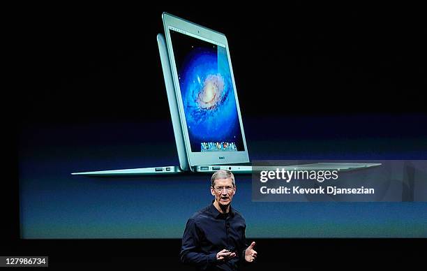 Apple CEO Tim Cook speaks at the event introducing the new iPhone at the company's headquarters October 4, 2011 in Cupertino, California. The...