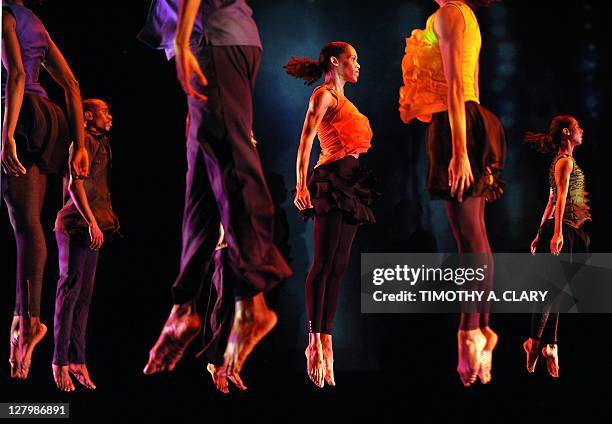 Dancers from Garth Fagan Dance perform a scene from the world premier of "Madiba" during a dress rehearsal before opening night at the Joyce Theater...