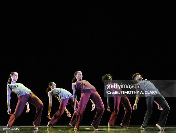 Dancers from Garth Fagan Dance performs a scene from the world premier of "Liminal Flux "during a dress rehearsal before opening night at the Joyce...