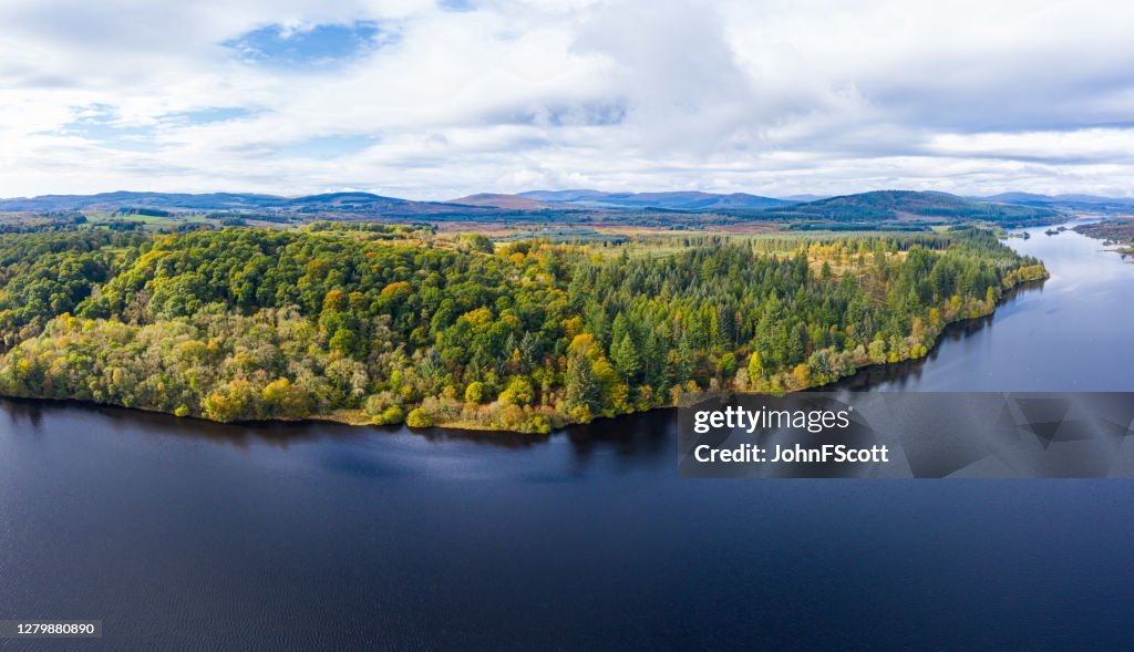 The aerial view of a slow moving river in rural Dumfries and Galloway south west Scotland