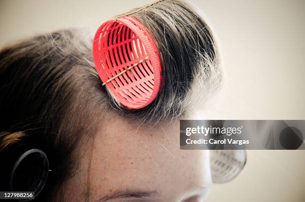 hair styling - hair rollers stock pictures, royalty-free photos & images