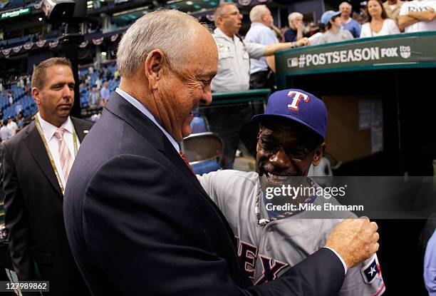 President and CEO Nolan Ryan and manager Ron Washington of the Texas Rangers celebrate after the Rangers defeat the Tampa Bay Rays 4-3 in Game Four...