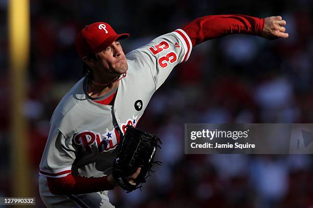 Cole Hamels of the Philadelphia Phillies throws a pitch against the St. Louis Cardinals during Game Three of the National League Division Series at...