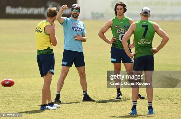 Matthew Scarlett the assistant coach of the Cats speaks to his players during a Geelong Cats AFL training session at Mantra Southport Sharks on...