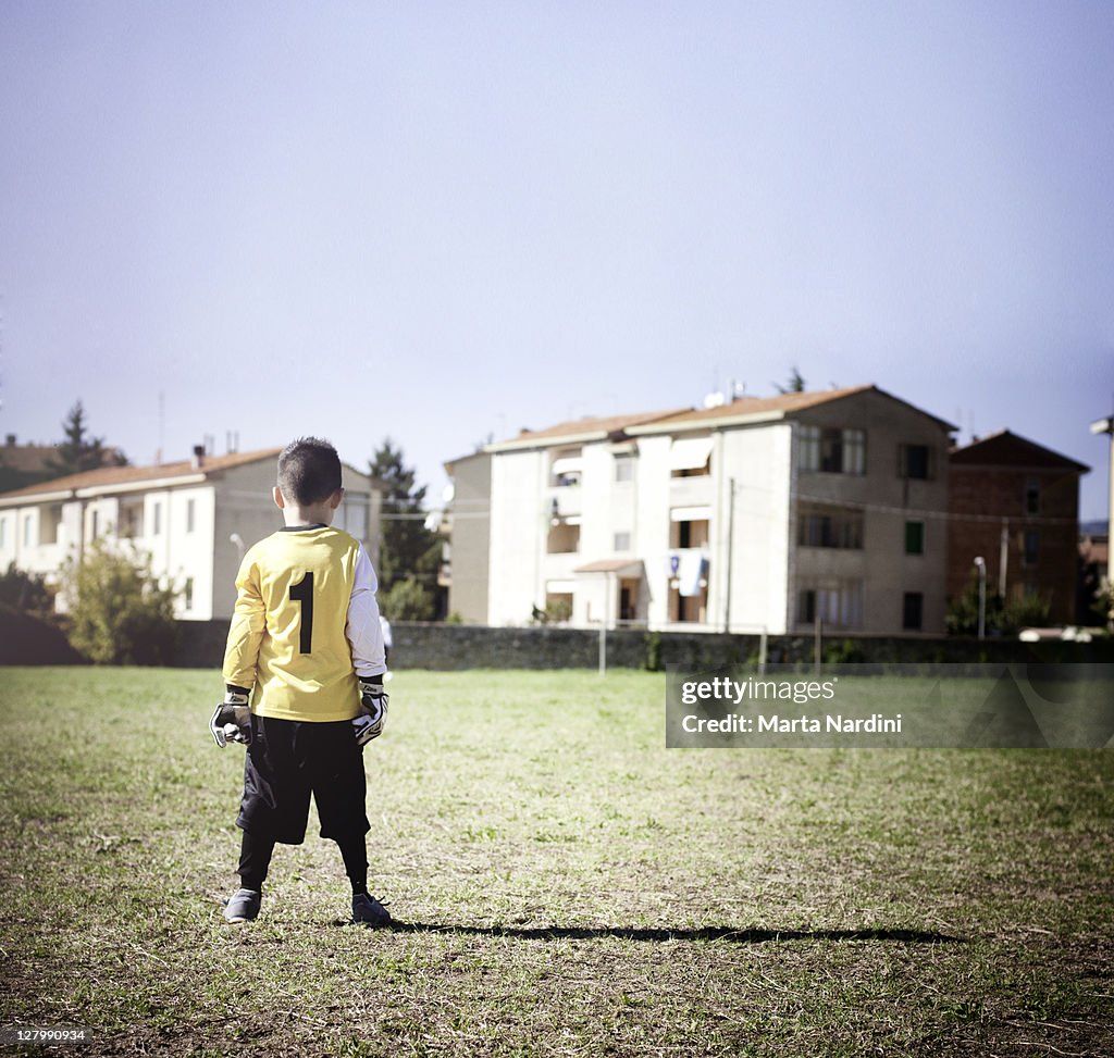 Boy in soccer field