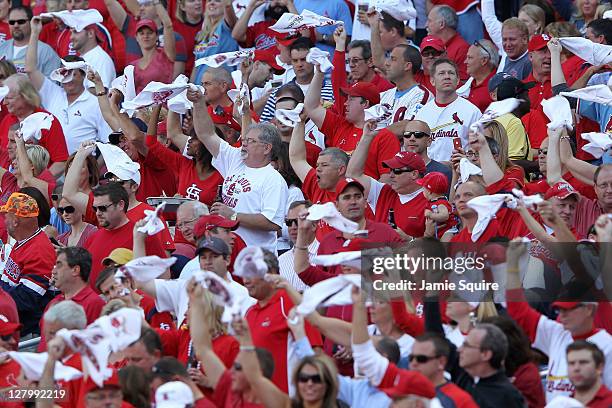 Fans cheer in the stands during Game Three of the National League Division Series between the Philadelphia Phillies and the St. Louis Cardinals at...