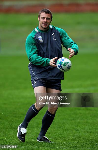 Wing Tommy Bowe passes the ball during an Ireland IRB Rugby World Cup 2011 training session at Rugby League Park on October 5, 2011 in Wellington,...