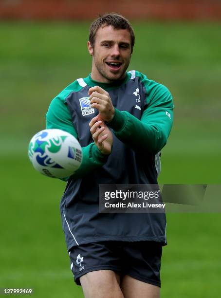 Wing Tommy Bowe passes the ball during an Ireland IRB Rugby World Cup 2011 training session at Rugby League Park on October 5, 2011 in Wellington,...
