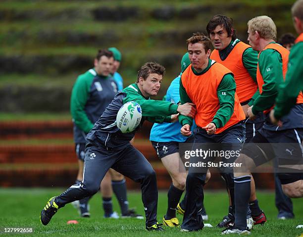 Brian O'Driscoll of Ireland challenges teammate Eoin Reddan during an Ireland IRB Rugby World Cup 2011 training session at Rugby League Park on...