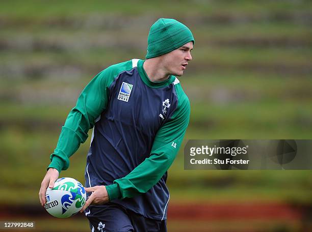 Jonathan Sexton of Ireland looks to pass the ball during an Ireland IRB Rugby World Cup 2011 training session at Rugby League Park on October 5, 2011...