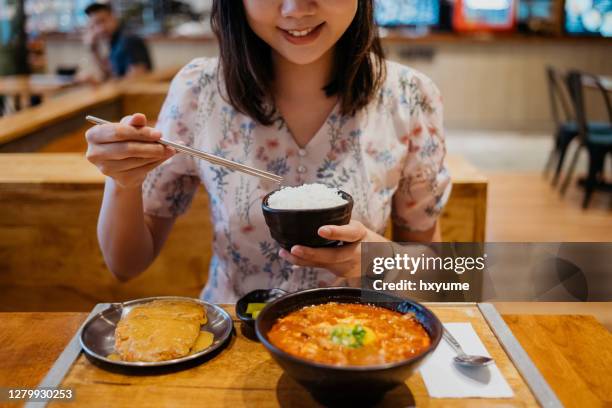 Asein Eating Rice 195 Asian Rice Eat Stock Photos, High-Res Pictures, and Images - Getty ...