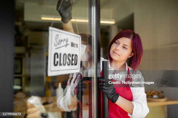 closing the store - store closing stock pictures, royalty-free photos & images