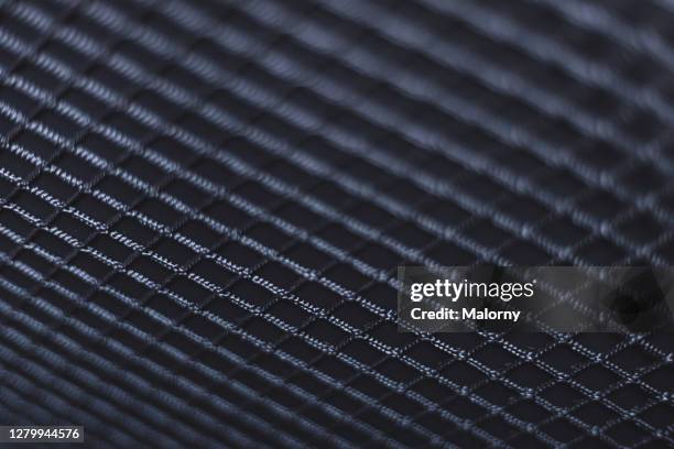 extreme close-up of net fabric. - netz textilien stock-fotos und bilder