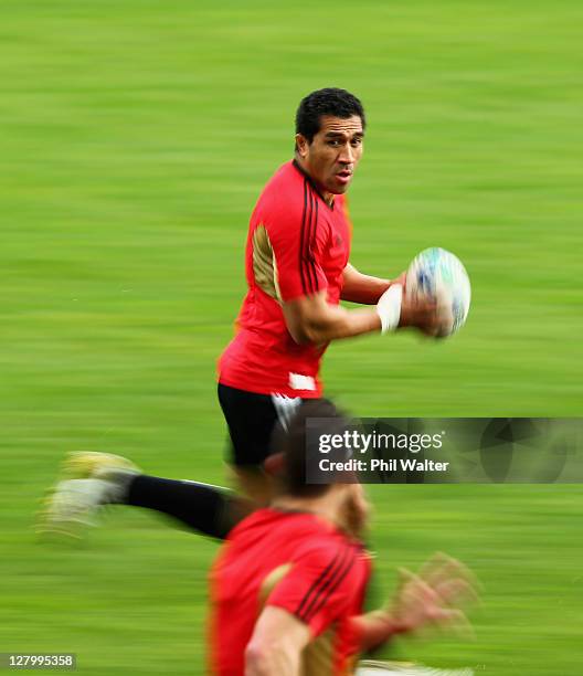 Mils Muliaina of the All Blacks runs the ball during a New Zealand IRB Rugby World Cup 2011 training session at North Harbour Stadium on October 5,...