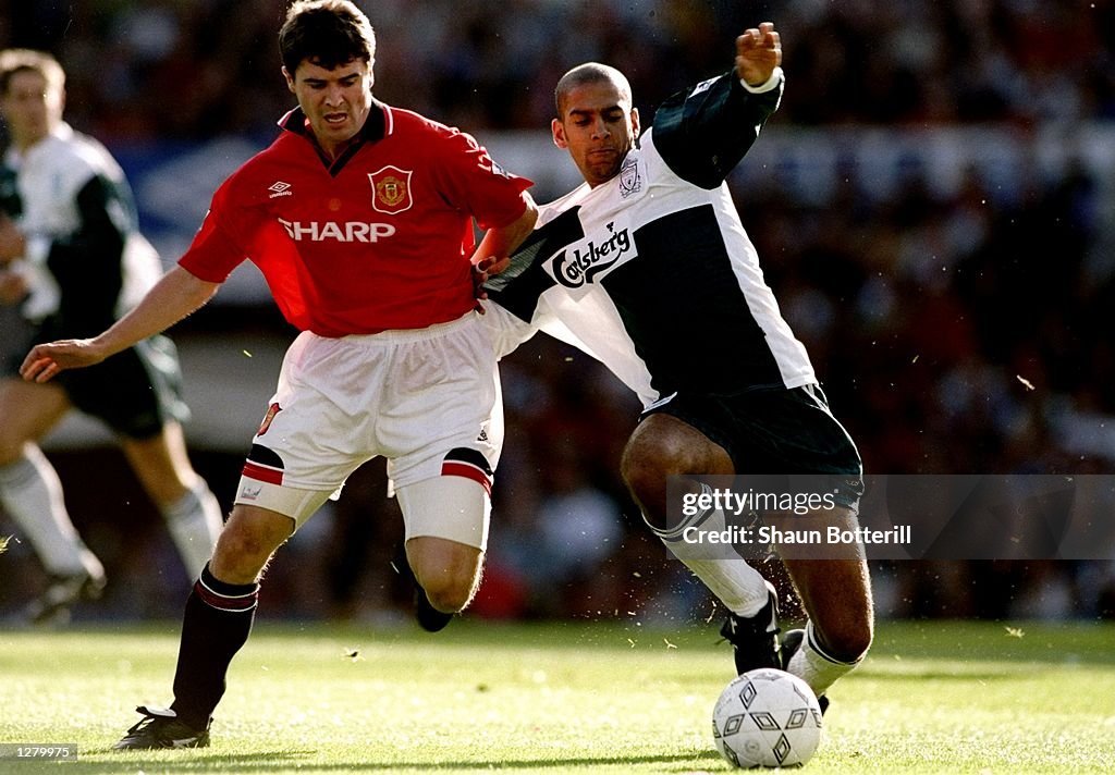 Roy Keane of Manchester United and Phil Babb of Liverpool