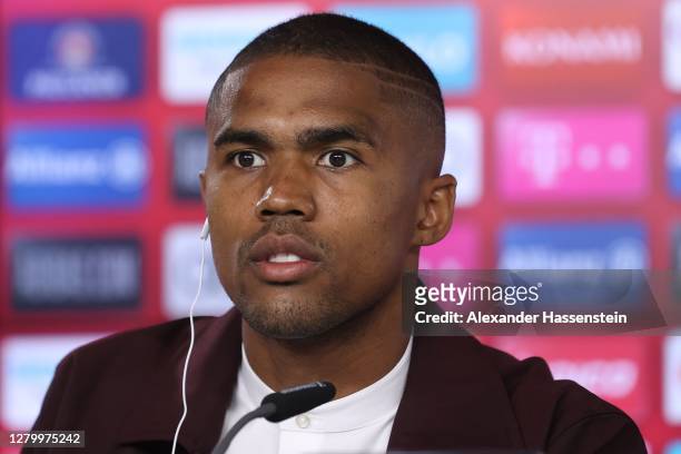 Newly signed FC Bayern Muenchen player Douglas Costa talks to the media during a virtual press conference at Säbener Strasse Training ground on...