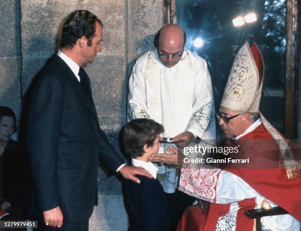 Spanish King Juan Carlos I in the First Communion of his son Felipe, Madrid, Spain, 1979. .