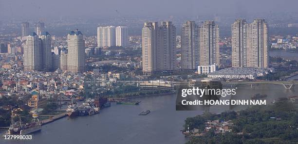 Vietnam-economy-property,FEATURE by Ian TIMBERLAKE This picture taken on April 12, 2011 shows an aerial view of a central part of Ho Chi Minh city...