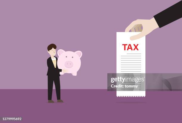 businessman uses a piggy bank to pay a tax - tax season stock illustrations