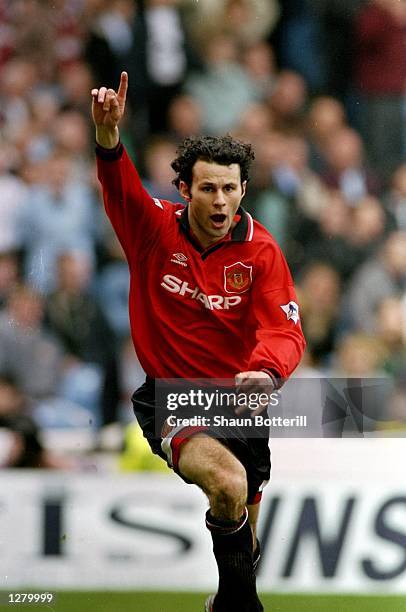 Ryan Giggs of Manchester United celebrates during an FA Carling Premiership match against Manchester City at Maine Road in Manchester, England....