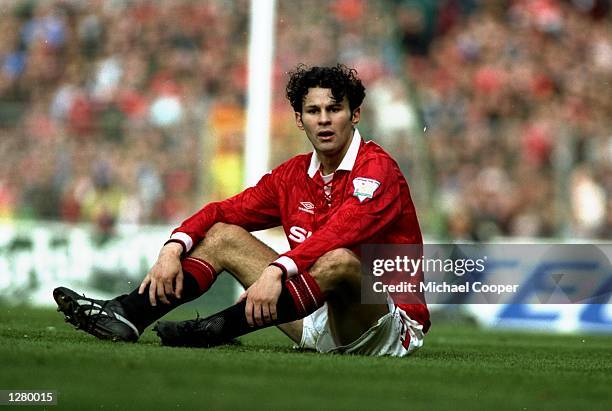 Ryan Giggs of Manchester United sits on the pitch during the FA Cup semi-final against Oldham Athletic at WEembley Stadium in London, England. \...