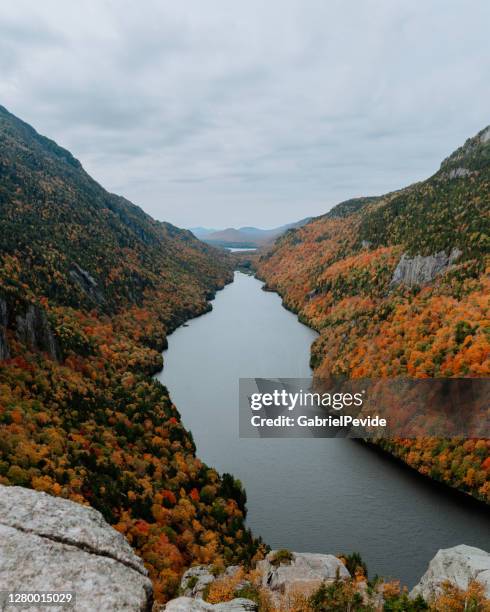 hiking in the adirondack mountain in the fall - adirondack mountains stock pictures, royalty-free photos & images