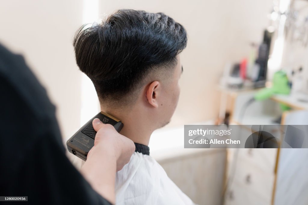 The Handsome Young Chinese Man Is Having His Hair Cut High-Res Stock Photo  - Getty Images