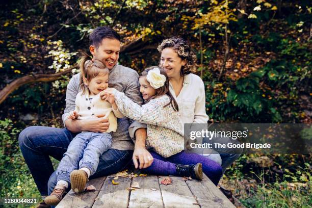 Family 3 Generations Sitting Garden Table Photos and Premium High Res ...