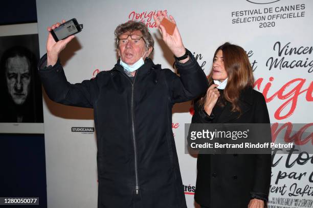 Etienne Chatiliez and his wife Emilie Broussouloux attend the "L'Origine du Monde" Premiere at cinema UGC Normandie on October 13, 2020 in Paris,...