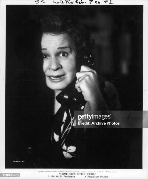 Shirley Booth frighten while on the phone in a scene from the film 'Come Back Little Sheba', 1952.