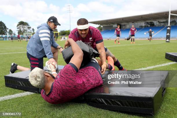 Ofa Tuungafasi and Patrick Tuipulotu of New Zealand during a New Zealand All Blacks training session at Trusts Stadium on October 14, 2020 in...