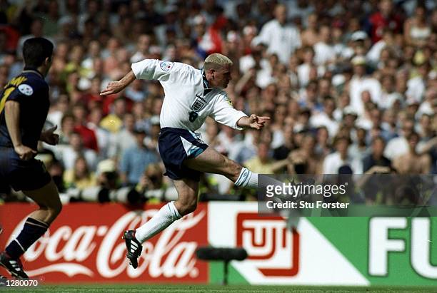 Paul Gascoigne of England scores their second goal during the European Championship match against Scotland at Wembley Stadium in London. England won...