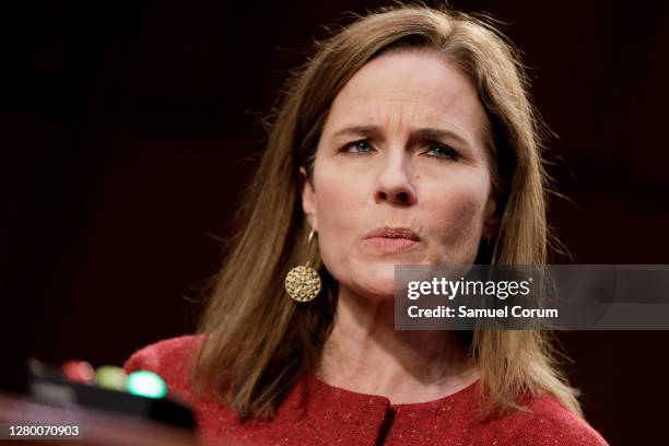 Supreme Court nominee Judge Amy Coney Barrett arrives to testify before the Senate Judiciary Committee on the second day of her Supreme Court...