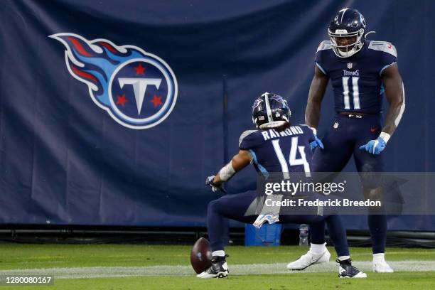 Kalif Raymond and A.J. Brown of the Tennessee Titans celebrate after Brown scored a touchdown in the first quarter against the Buffalo Bills at...