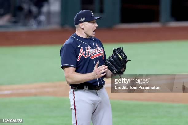 Mark Melancon of the Atlanta Braves reacts after recording the final out against the Los Angeles Dodgers to secure the 8-7 victory against the Los...