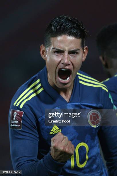 James Rodríguez of Colombia celebrates after the second goal of his team scored by teammate Radamel Falcao García during a match between Chile and...