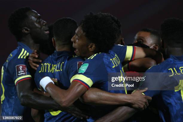 Radamel Falcao García of Colombia celebrates with teammates Jeison Murillo and Johan Mojica after scoring the second goal of his team during a match...