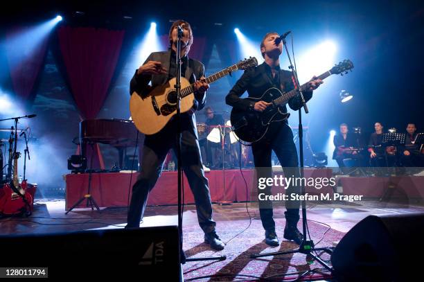 Bjoern Dixgard and Gustaf Noren of Mando Diao perform on stage at Zenith on October 4, 2011 in Munich, Germany.