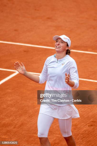 October 10. Iga Swiatek of Poland celebrates her victory against Sofia Kenin of the United States in the Singles Final on Court Philippe-Chatrier...