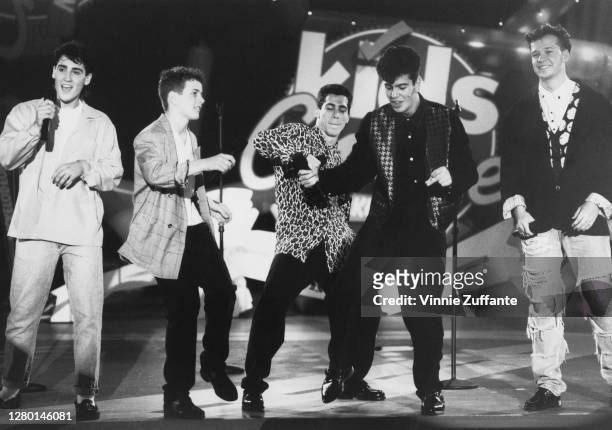 American boy band New Kids on the Block perform live on stage at the 1989 Nickelodeon Kids' Choice Awards, held at Universal Studios Hollywood in Los...