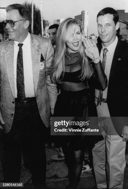 Donald Basinger with his daughter, American actress Kim Basinger, and son, Mick Basinger attend the Los Angeles premiere of 'Batman', held at the...