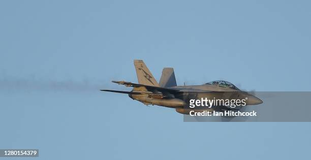 Super Hornet conducts a strafing run as part of Exercise Nigrum Pugio on October 14, 2020 in Townsville, Australia. Exercise Nigrum Pugio 20-2 is a...