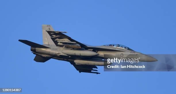 Super Hornet conducts a strafing run as part of Exercise Nigrum Pugio on October 14, 2020 in Townsville, Australia. Exercise Nigrum Pugio 20-2 is a...