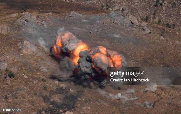 An explosion from a Mk-82 bomb is seen after being dropped from a F/A-18F Super Hornet during Exercise Nigrum Pugio on October 14, 2020 in...