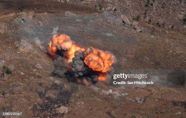 An explosion from a Mk-82 bomb is seen after being dropped from a F/A-18F Super Hornet during Exercise Nigrum Pugio on October 14, 2020 in...