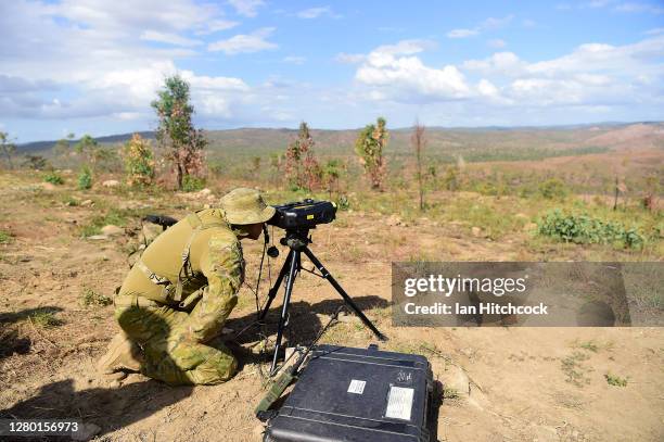 Joint Terminal Attack Controller looks through a laser target designator as part of Exercise Nigrum Pugio on October 14, 2020 in Townsville,...